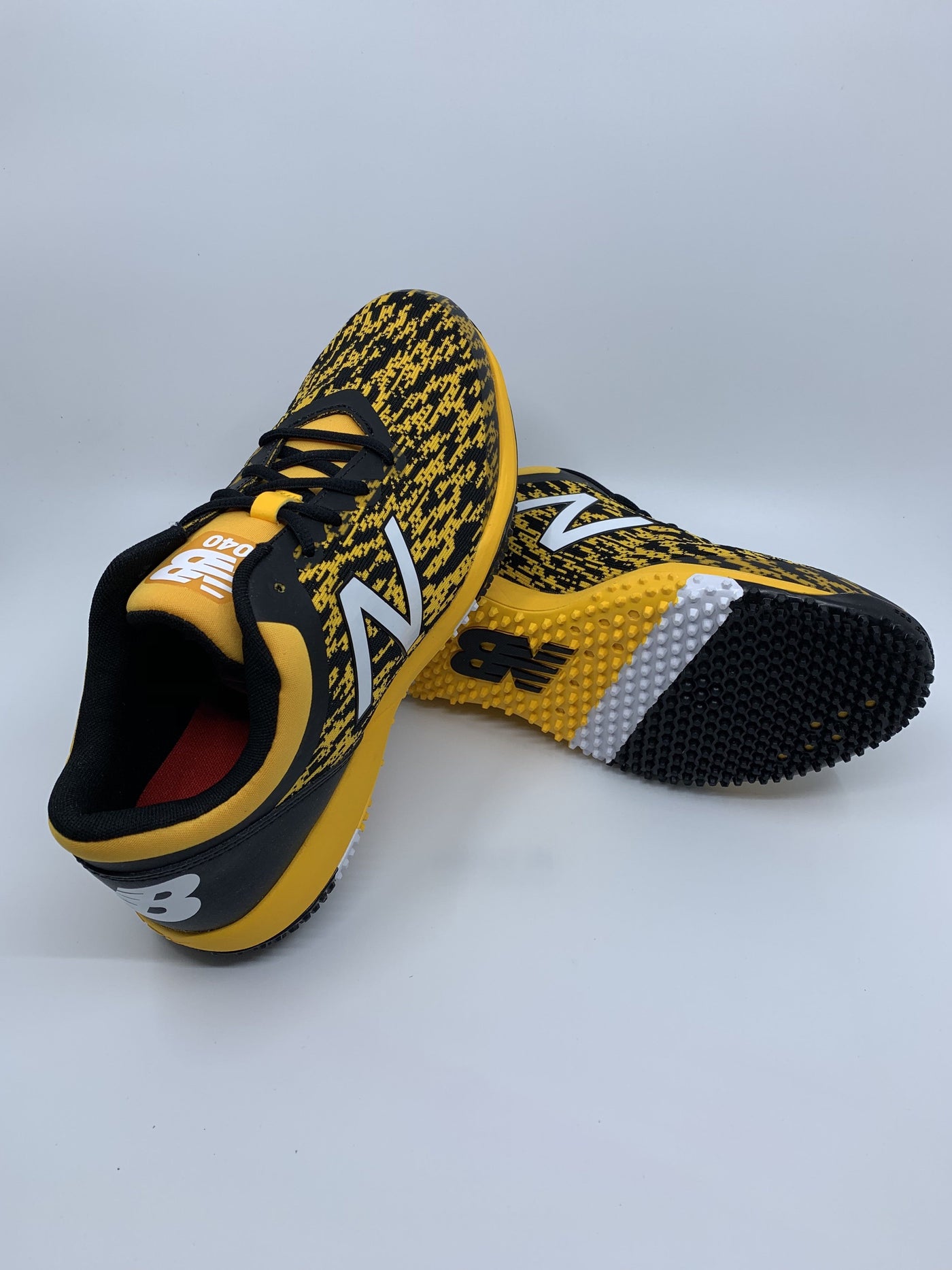 black and gold baseball turf shoes