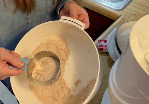 Grinding whole wheat flour with the NutriMill Classic flour mill from Pleasant Hill Grains in Nebraska