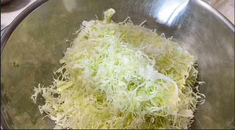 Making sauerkraut at Prairie Road Organic Seed