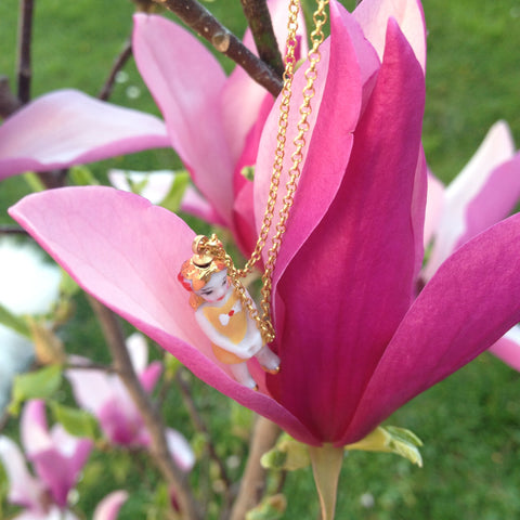 Magnolia and porcelain mini figurine necklace