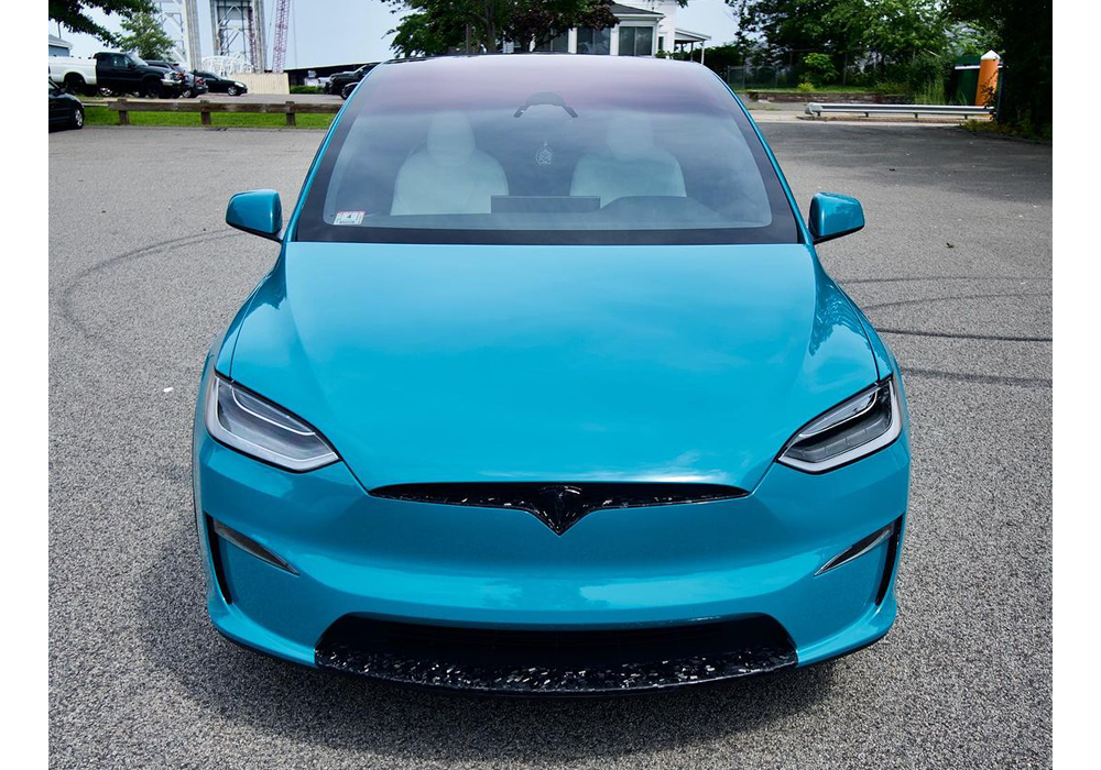 OEM Porsche Miami Blue on Tesla Model X