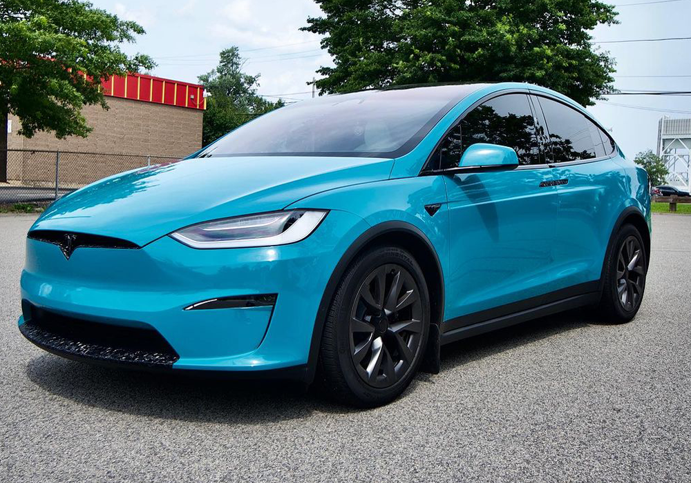 OEM Porsche Miami Blue on Tesla Model X