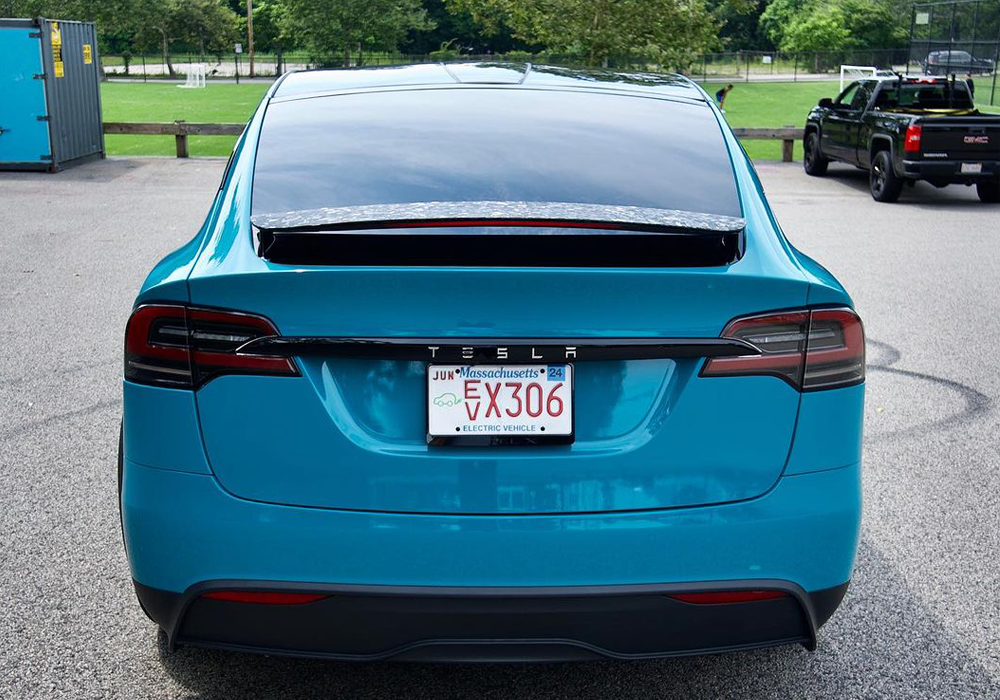 OEM Porsche Miami Blue on Tesla Model X