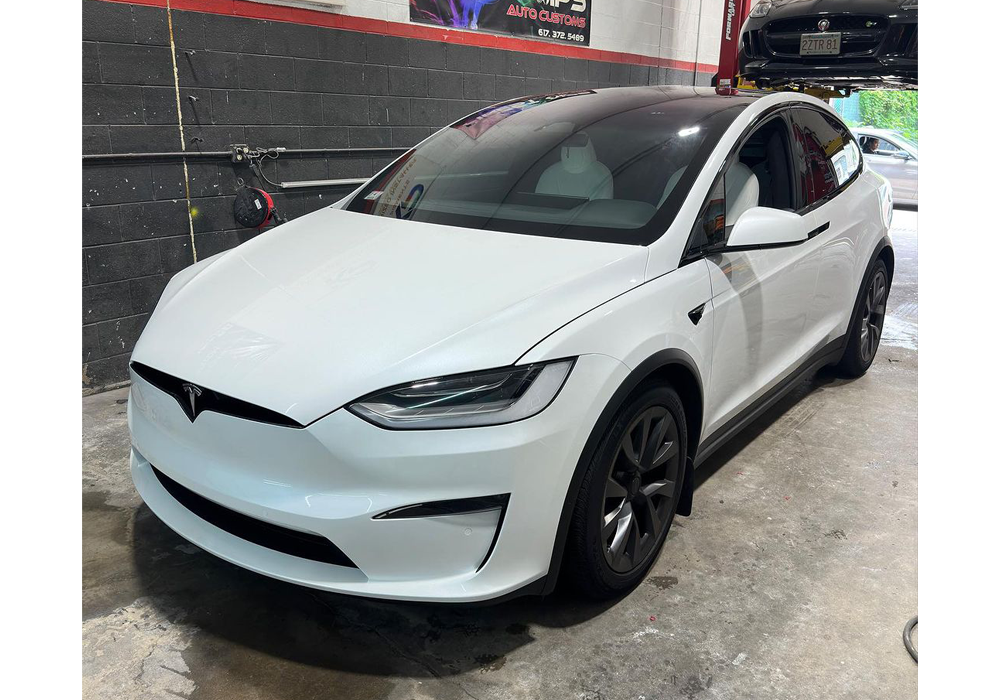 OEM Porsche Miami Blue on Tesla Model X