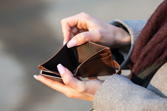 Woman with an empty wallet