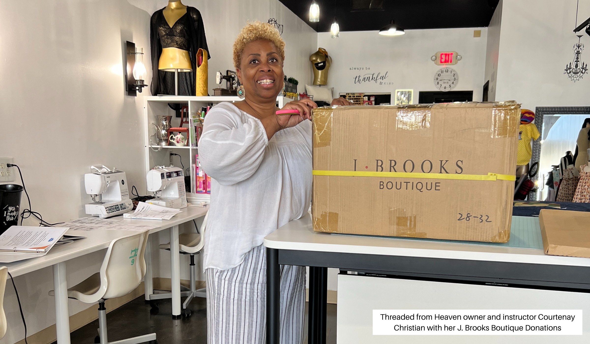 Owner and instructor Courtenay Christian opening her J. Brooks Boutique Donations