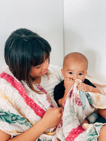 emily from kaulumaika with na lei o hawaii kapa moe swaddle blanket