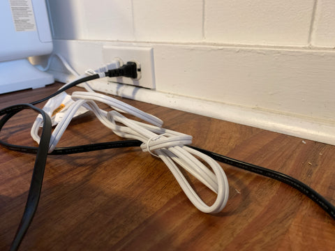 wires plugged into outlet