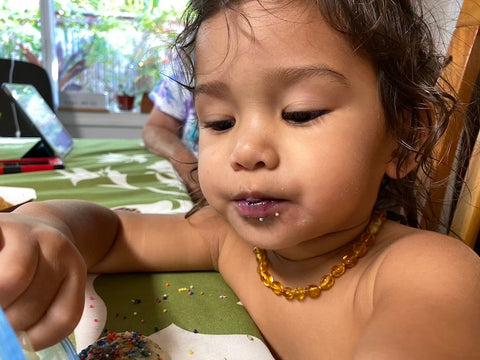 toddler eating sprinkles