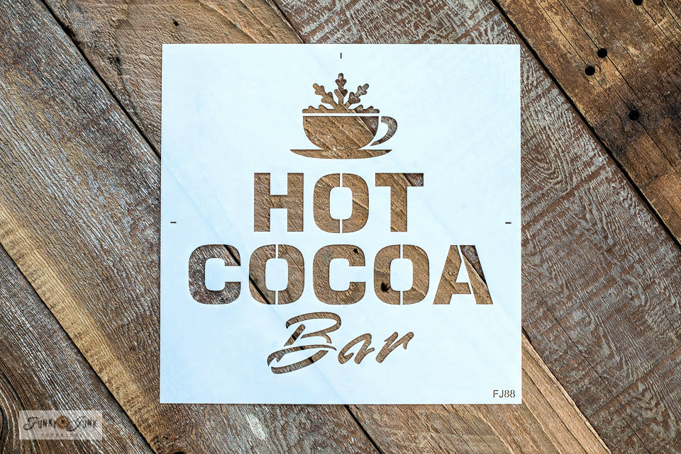 Deliver delicious winter vibes with our Hot Cocoa Bar Stencil by Funky Junk's Old Sign Stencils! Helps you create a warm and cozy sign for your hot cocoa station. Perfect for Christmas and all winter long, this Christmas stencil also includes a cute cup with a frosty snowflake.