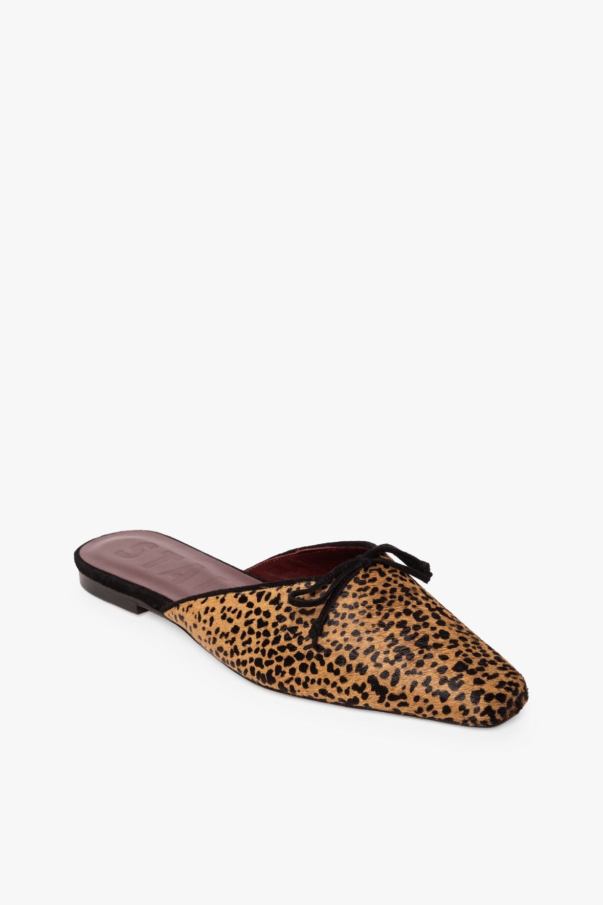 cheetah slip on mules