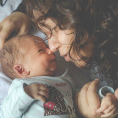 DIY Newborn Photographs - How to take new baby photos.  Fresh 24 photos.  Newborn Baby first smile