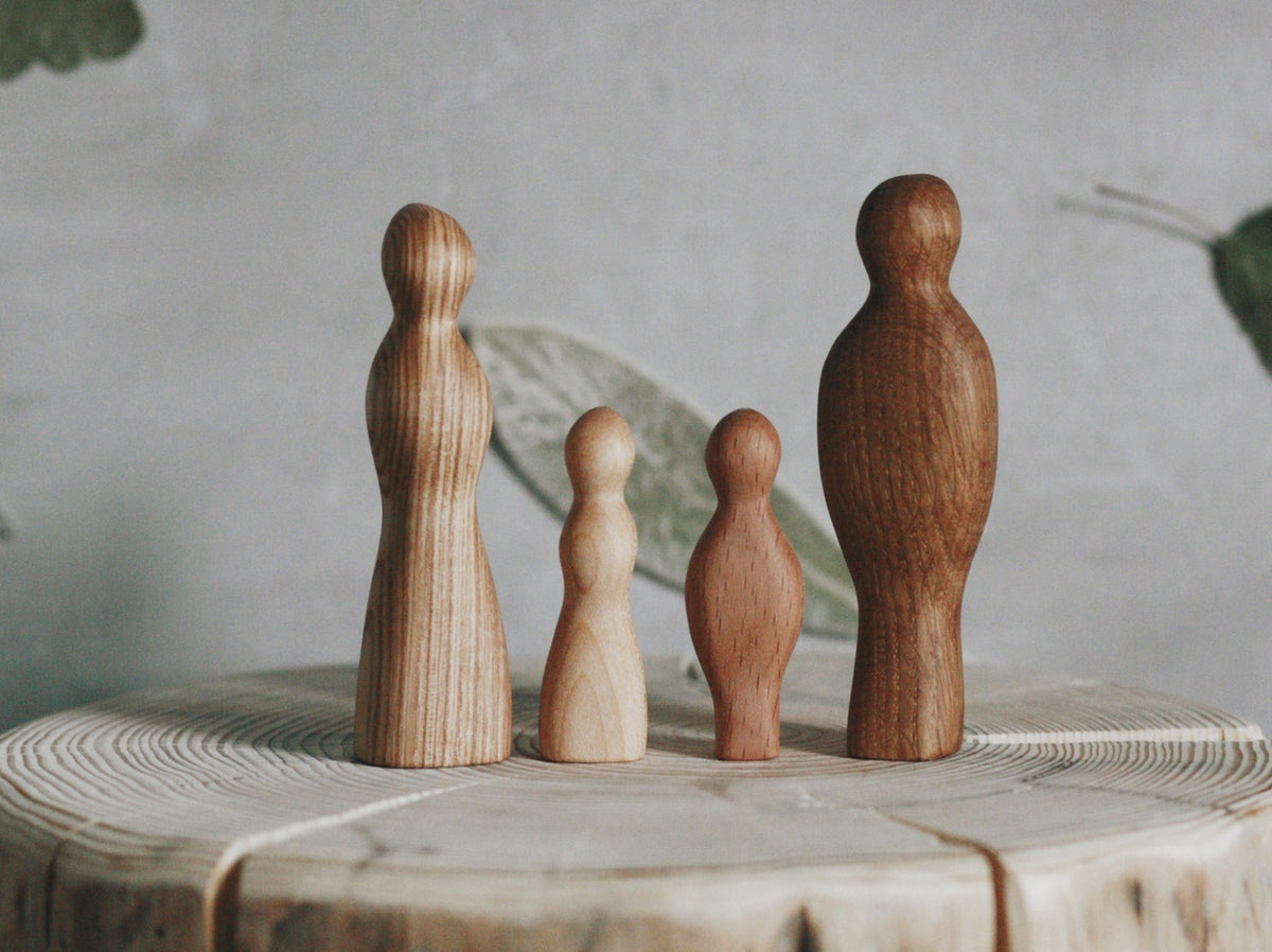 wooden family figures