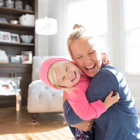 Happy Mom VitaCup Hugging Child