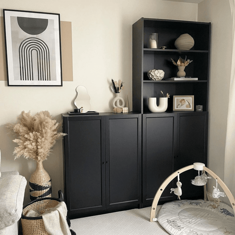 Black accents work beautifully with warm neutral schemes.