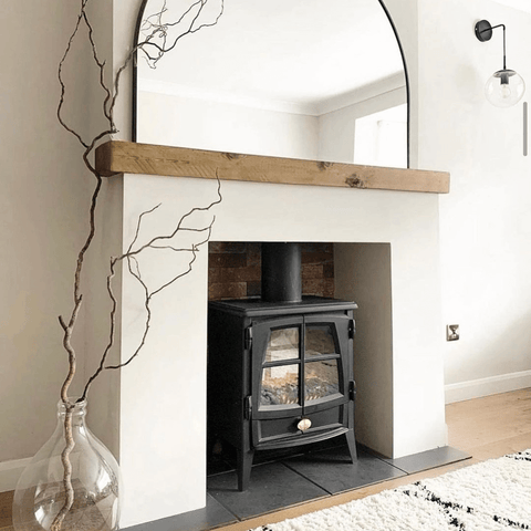 An electric log-burning stove is a great way to add old-world charm without all the mess of a real fire.