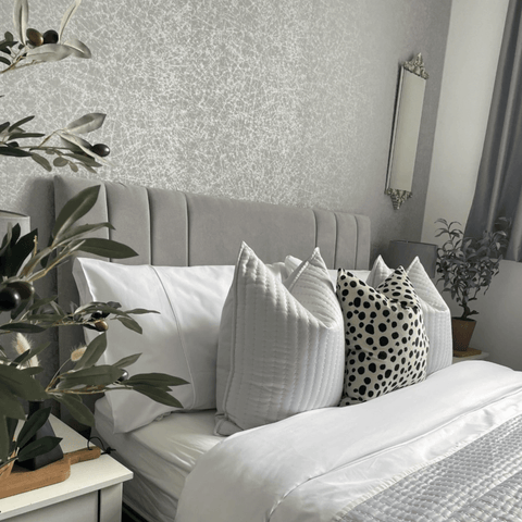 Olive trees and a set of pure white Hampton and Astley Egyptian cotton bedding create a fresh look for Spring.