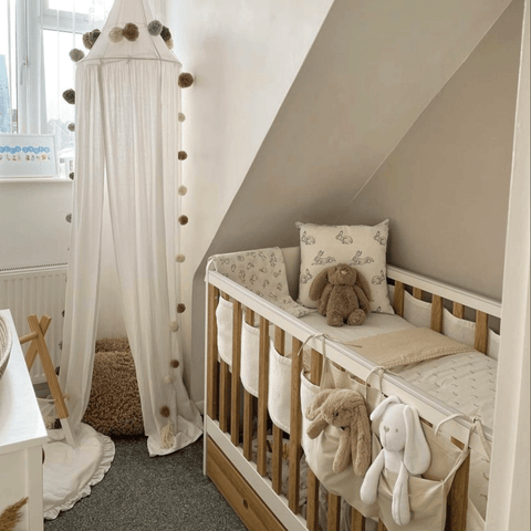We just adore this bunny themed nursery, decorated in beautiful neutral shades.