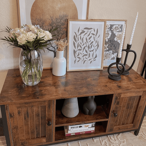 In the living area, a gorgeous rustic sideboard is both practical and stylish.
