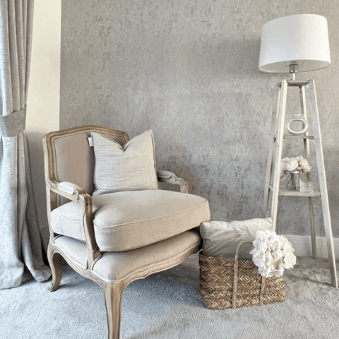 We love the elegant statement chair in this cosy corner.