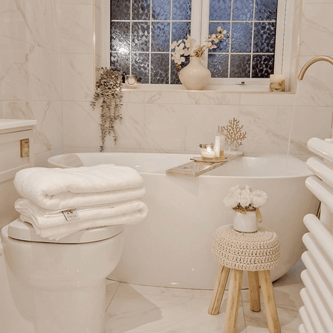 Gold taps add instant glamour to the bathroom, which features Hampton and Astley indulgently thick Egyptian cotton towels.