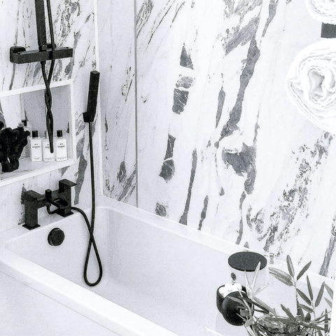 Black fittings in a white bathroom add a fresh, contemporary look, making them a modern classic.
