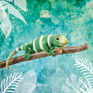 Crocheted green and white striped iguana