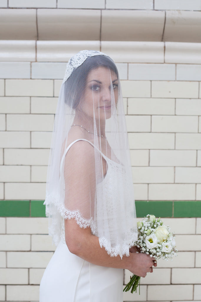 Silk elbow length veil with blusher down