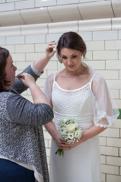 Pinning a bridal veil in place