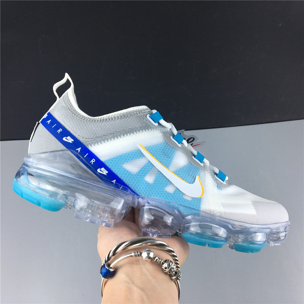 vapormax white university gold