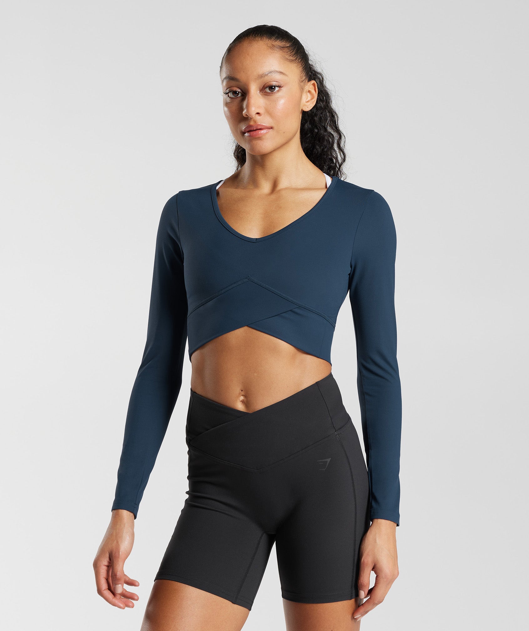 Crossover Long Sleeve Crop Top in Navy - view 1
