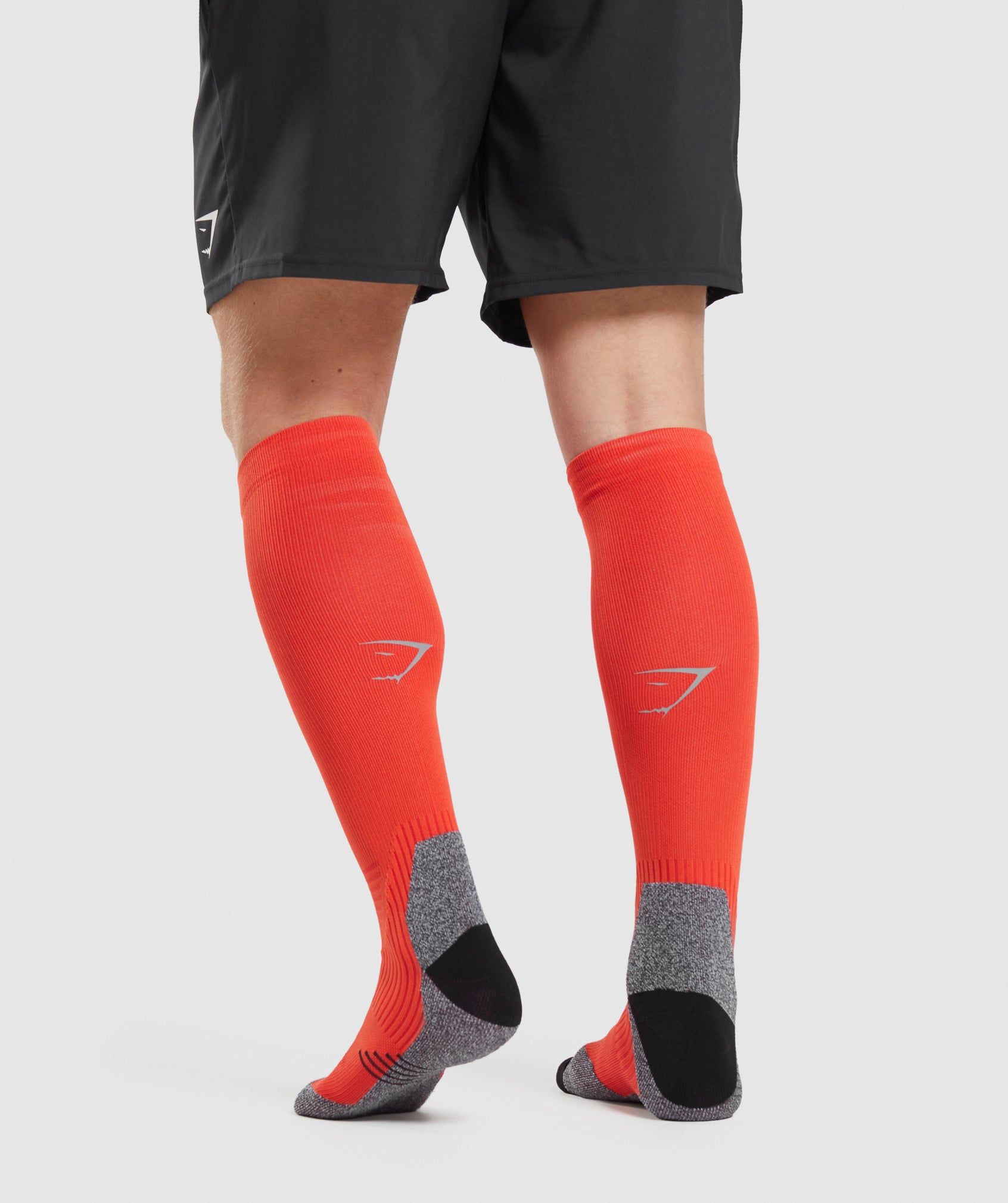 Long Performance Socks in Papaya Orange