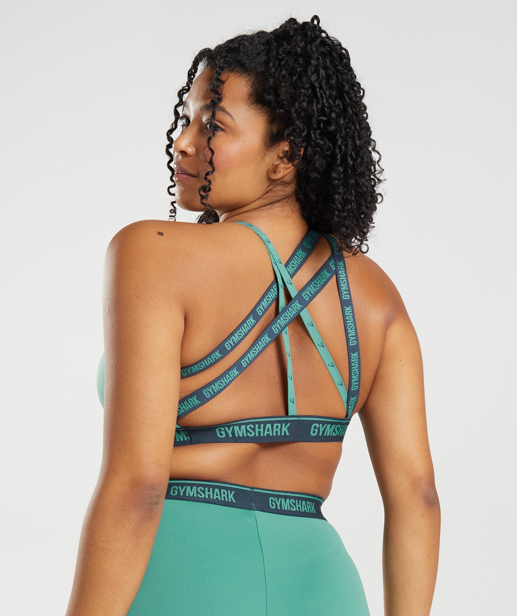 Strike Sports Bra in Alpine Green/Navy - view 2