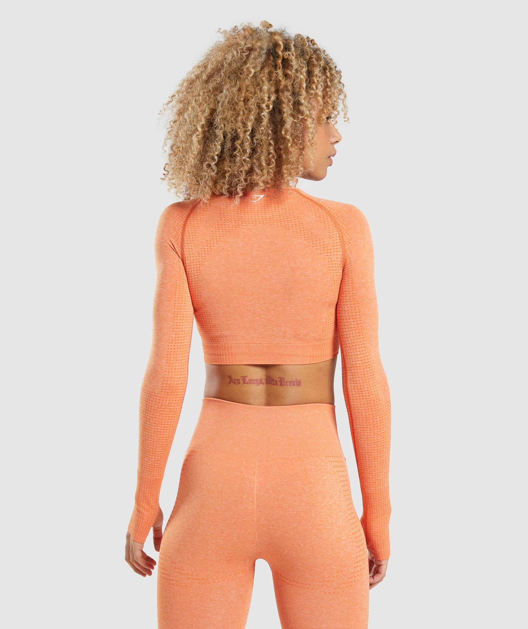 Vital Seamless 2.0 Long Sleeve Crop Top in Apricot Orange Marl