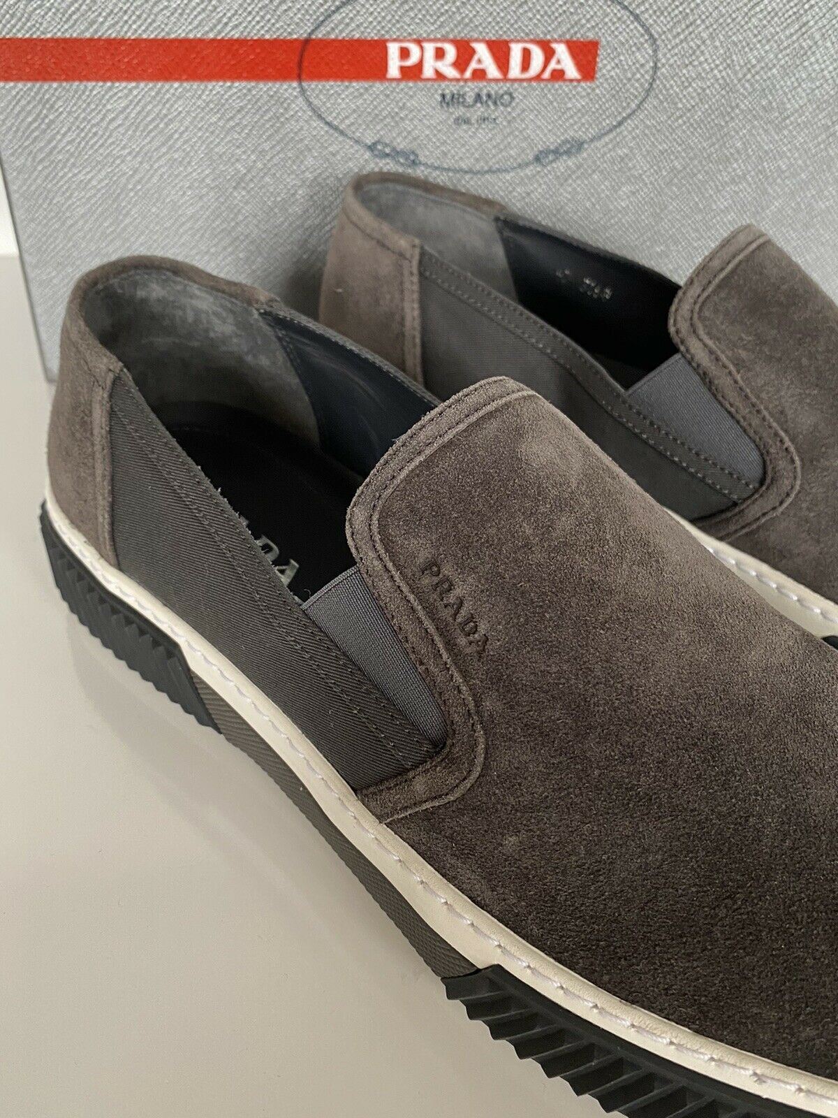 prada suede slip on sneakers