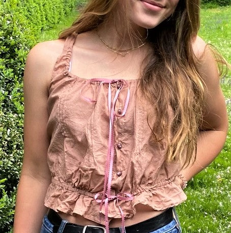 woman wearing pink camisole