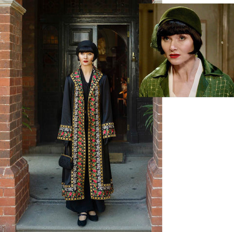 Miss Fisher wearing a black overcoat with trim on front edges and cuffs; and a head shot of her in a green cloche.