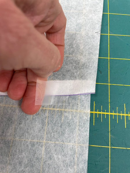 taping the fold of a pattern piece