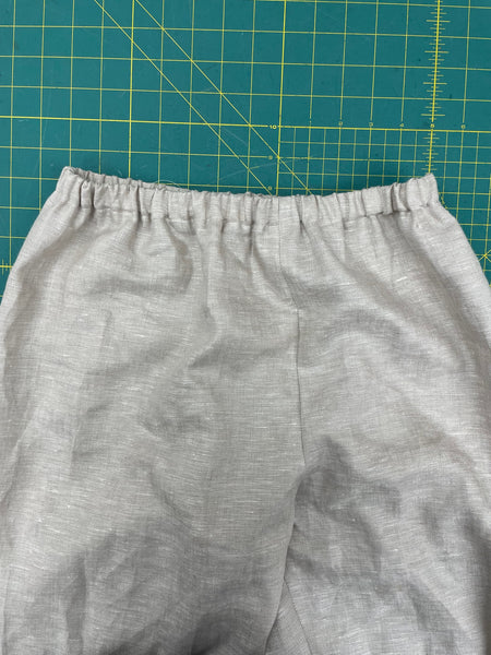 top of pants with elastic laying on a cutting mat