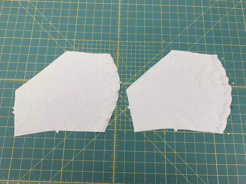 Pinning of Front Bodice Front A Outer Fabric and Lining on green cutting mat.