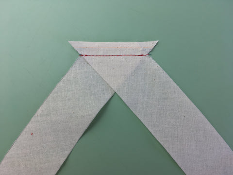 Photo of strip ends stitched together to create longer bias strip