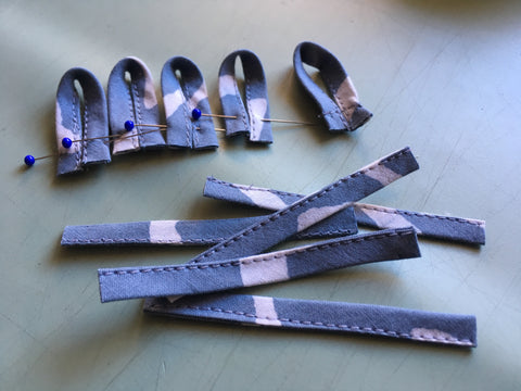 photo of button-loops and strips in progress