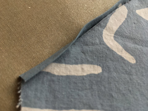 photo up close of raw edge sandiched in bias tape fold