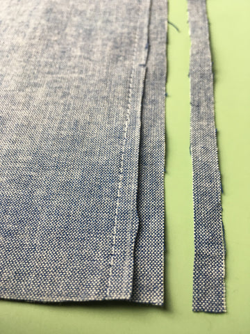 Step Two to Making Flat-Felled Seams: one edge of seam trimmed