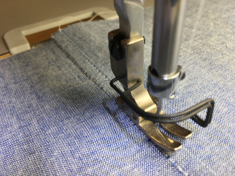 Step Four to Making Flat-Felled Seams: Stitching close to turned seam edge