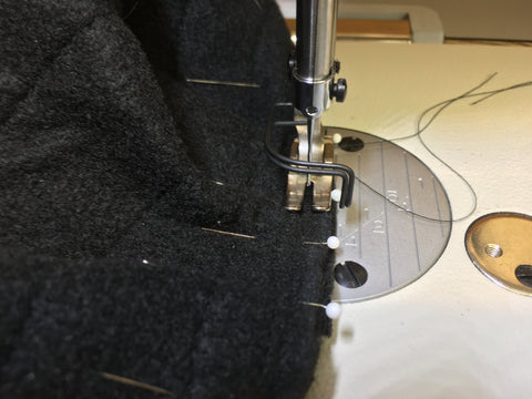 Photo showing hat being sewn on seam allowance