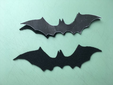 Photo of paper template used as pattern to cut of felt bats