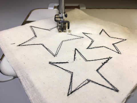 Photo showing muslin stars sewn using machine