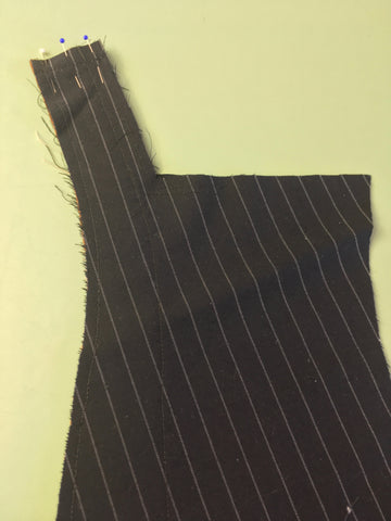 Photo of vest front neck band seam stitched