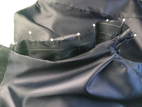 Photo of the vest side seam pinned and stitched together